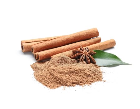 Powder with cinnamon sticks, anise and leaf on white background