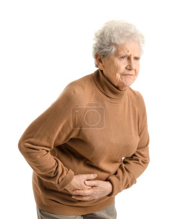 Foto de Mujer mayor con apendicitis sobre fondo blanco - Imagen libre de derechos
