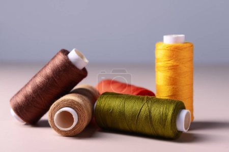 Photo for Different thread spools on light table - Royalty Free Image