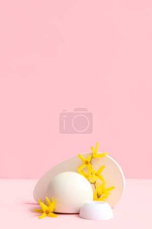 Photo for Decorative podiums and beautiful flowers on pink background - Royalty Free Image