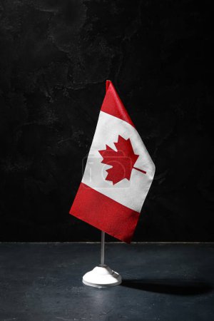 Photo for Flag of Canada on dark background - Royalty Free Image