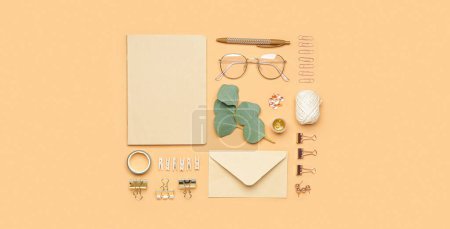 Photo for Set of school supplies with eyeglasses and envelope on beige background - Royalty Free Image