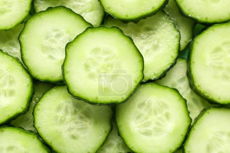 Photo for Texture of sliced cucumber as background - Royalty Free Image