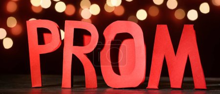 Photo for Word PROM on dark background with blurred lights - Royalty Free Image