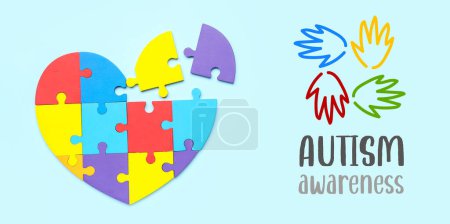 Photo for Heart made of jigsaw puzzle pieces on light blue background. World Autism Awareness Day - Royalty Free Image