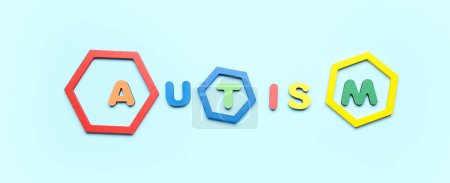 Photo for Word AUTISM on light blue background - Royalty Free Image