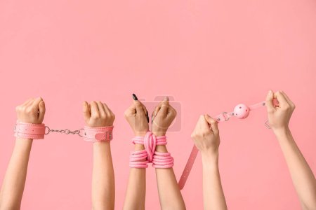Photo for Women with sex toys on pink background - Royalty Free Image