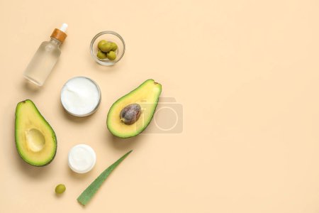 Composition with natural cosmetics, avocado, olives and aloe leaf on color background