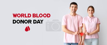 Bannière pour la Journée mondiale du don de sang avec un jeune couple