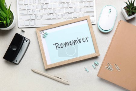 Photo for Reminder with stationery and computer keyboard on light background - Royalty Free Image