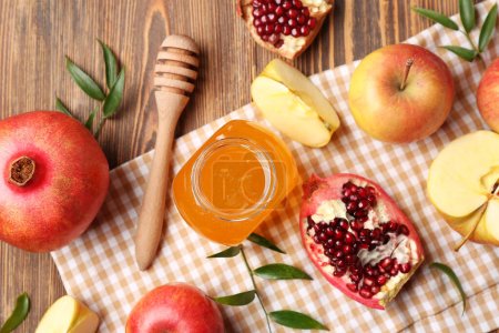 Photo for Composition with ripe fruits and honey on wooden background, closeup. Rosh hashanah (Jewish New Year) celebration - Royalty Free Image