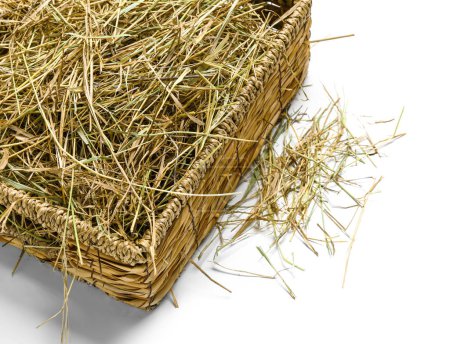 Photo for Straw in basket on white background - Royalty Free Image