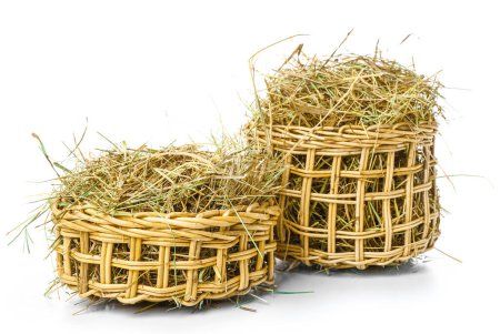 Photo for Straw in baskets on white background - Royalty Free Image
