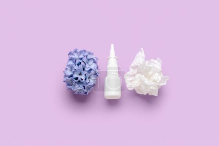 Photo for Nasal drops with flower and tissue on lilac background. Seasonal allergy concept - Royalty Free Image