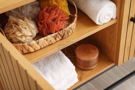 Photo for Chest of drawers with bath accessories in room, closeup - Royalty Free Image