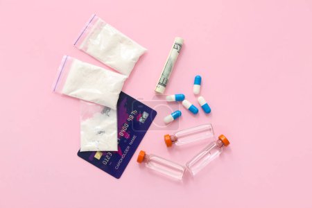 Photo for Composition with drugs, money and credit card on pink background - Royalty Free Image