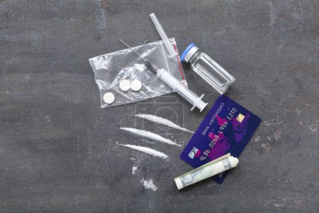 Photo for Composition with drugs, syringe, money and credit card on color background - Royalty Free Image