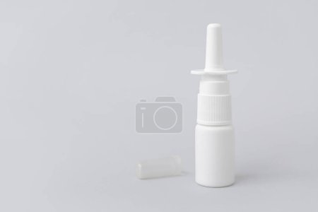 Photo for Bottle of nasal drops on grey background - Royalty Free Image