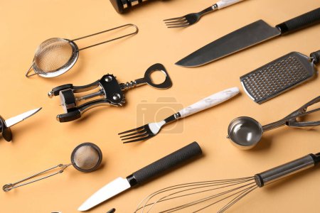Photo for Different kitchen utensils on yellow background - Royalty Free Image