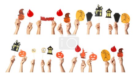 Téléchargez les photos : Ensemble de nombreuses mains avec décor d'Halloween sur fond blanc - en image libre de droit
