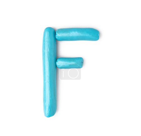 Photo for Letter F made of play dough on white background - Royalty Free Image