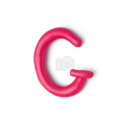 Photo for Letter G made of play dough on white background - Royalty Free Image
