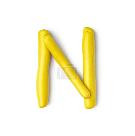Photo for Letter N made of play dough on white background - Royalty Free Image