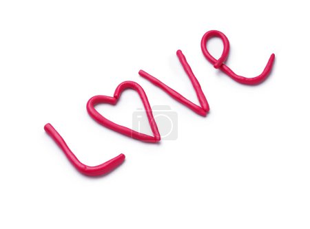 Photo for Word LOVE made of play dough on white background - Royalty Free Image