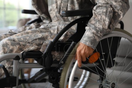 Photo for Female soldier in wheelchair at home, closeup - Royalty Free Image