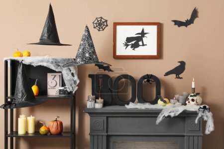 Photo for Interior of living room decorated for Halloween with shelf unit and mantelpiece - Royalty Free Image