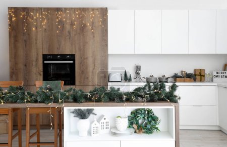 Photo for Interior of modern kitchen with Christmas decor - Royalty Free Image