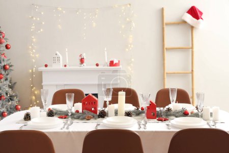 Photo for Festive table setting with Christmas decor at home - Royalty Free Image