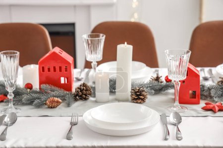 Photo for Festive table setting with Christmas decor at home - Royalty Free Image