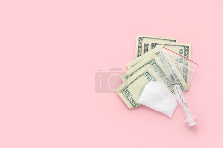 Photo for Drugs, syringe and money on pink background - Royalty Free Image