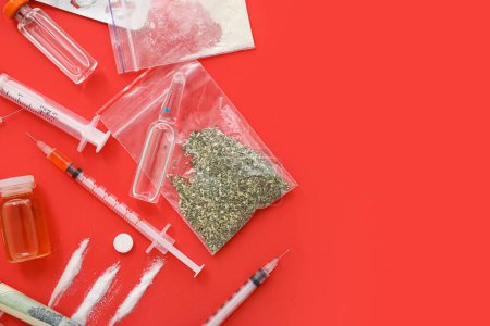 Photo for Composition with different drugs and syringes on red background - Royalty Free Image