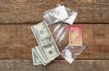 Photo for Composition with drugs, money and credit card on wooden background - Royalty Free Image