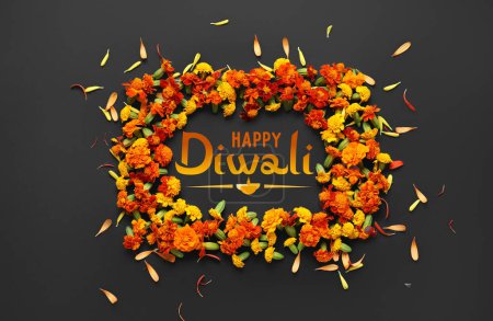 Photo for Greeting card for Diwali (Indian Festival of Lights) with marigold flowers on dark background - Royalty Free Image