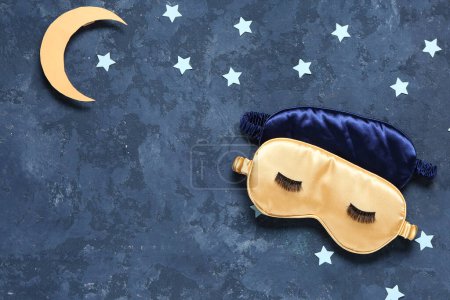Photo for Creative composition with sleep masks and paper decor on color background - Royalty Free Image