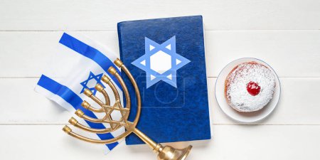 Photo for Tasty donut, Torah, flag of Israel and hanukkiah on white wooden background. Hannukah celebration - Royalty Free Image