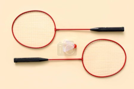 Photo for Badminton rackets with shuttlecock on color background - Royalty Free Image