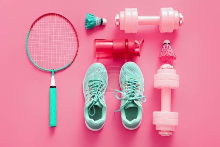 Photo for Composition with different sports equipment and shoes on pink background - Royalty Free Image