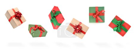 Flying Christmas gifts on white background