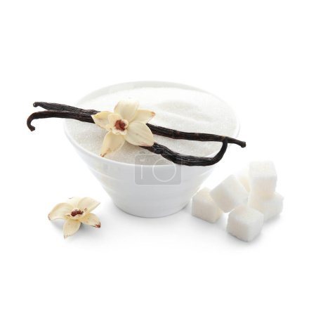 Bowl with aromatic vanilla sugar, flowers and sticks on white background