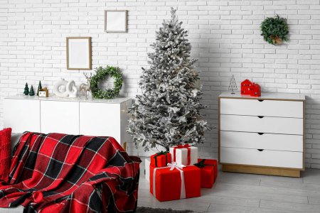 Photo for Interior of stylish living room with beautiful Christmas tree and gift boxes - Royalty Free Image