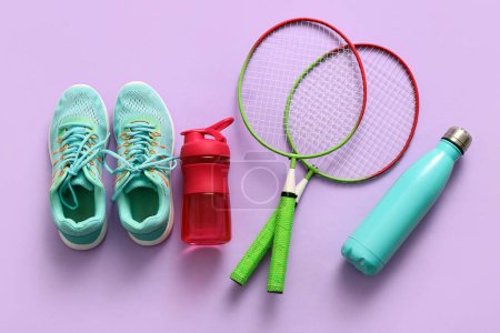 Photo for Set of sports equipment on lilac background - Royalty Free Image