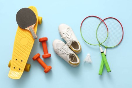 Photo for Set of sports equipment with stylish shoes on color background - Royalty Free Image