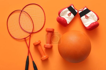Photo for Set of sports equipment on orange background - Royalty Free Image