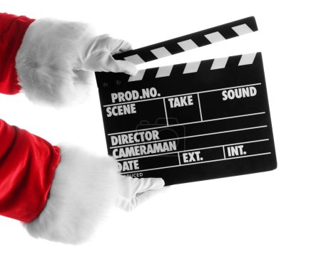 Photo for Santa hands with movie clipper on white background - Royalty Free Image