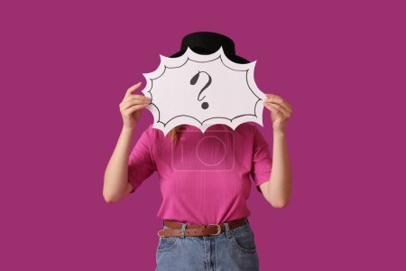 Photo for Young woman holding speech bubble with question mark on purple background - Royalty Free Image