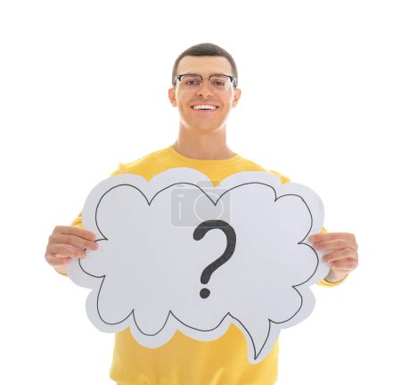 Photo for Young man holding speech bubble with question mark on white background - Royalty Free Image